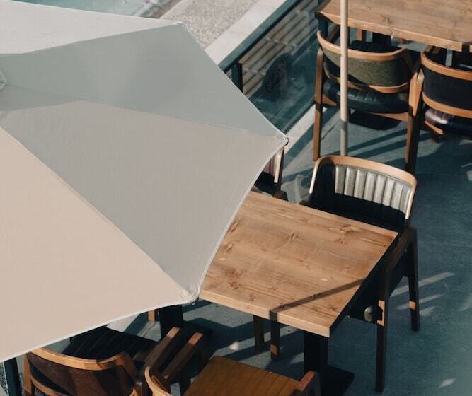 Отель The Ivy Suites