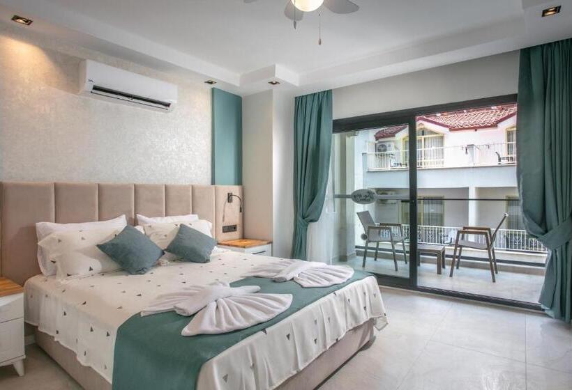 Отель The Ivy Suites