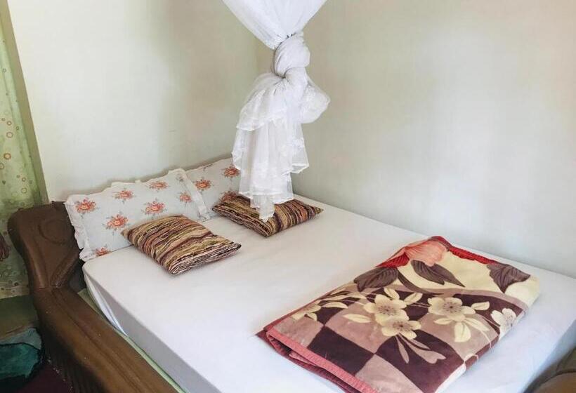 تختخواب و صبحانه Paradise Gardens Kajjansi