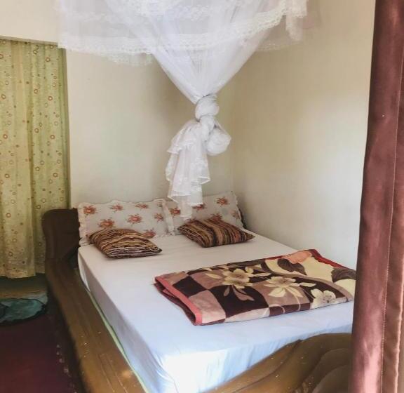 تختخواب و صبحانه Paradise Gardens Kajjansi