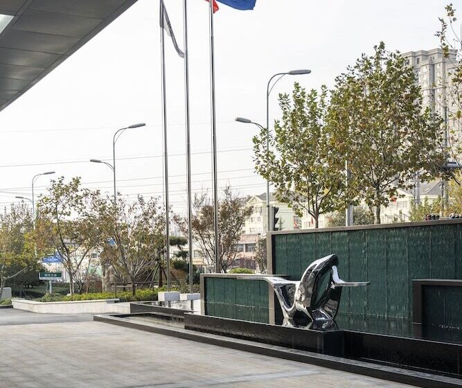 Hotel Qing Dao Bu Ke Bu Zhu