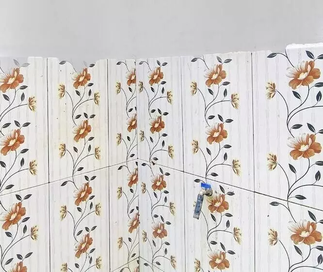 Hotelli Spot On 92281 Susupuan Kostneartaman Deki Lestari