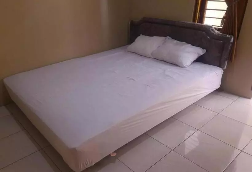 ホテル Oyo 93521 Wisma Flamboyan