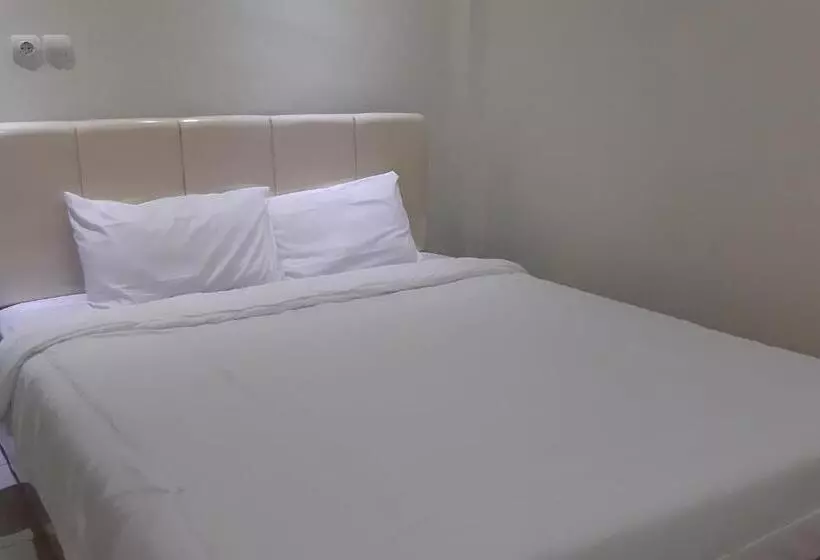 ホテル Oyo 93521 Wisma Flamboyan