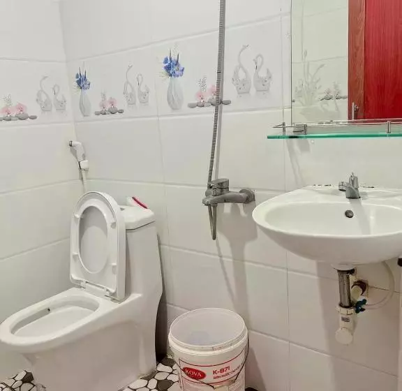 تختخواب و صبحانه Nhà Nghỉ Phương Nam