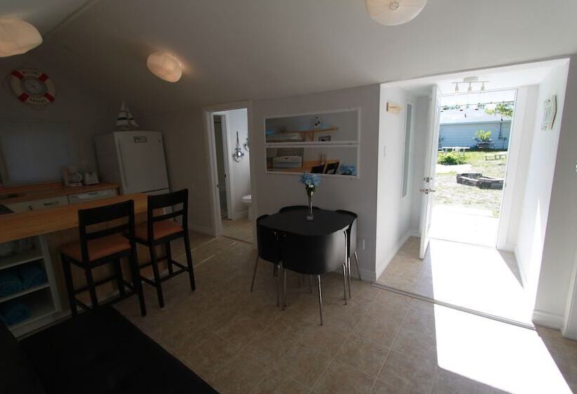 Отель Plovers Cove Cottage