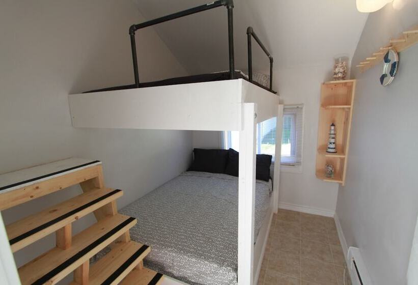 Отель Plovers Cove Cottage