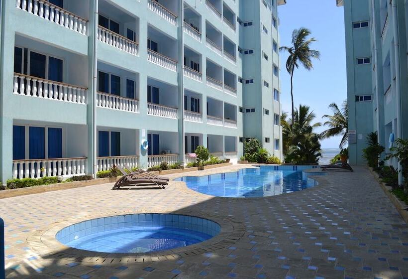 Cowrie Shell Beach Apartments Official