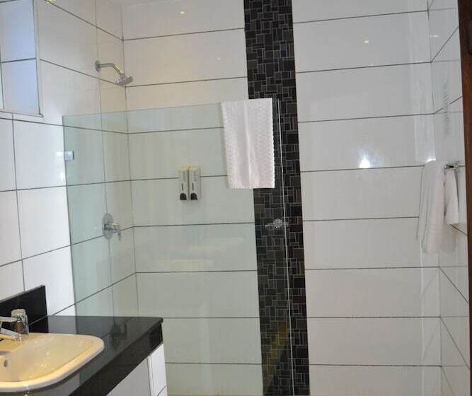 Cowrie Shell Beach Apartments Official