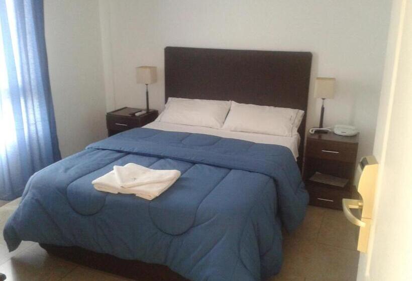 Отель Morada Suites