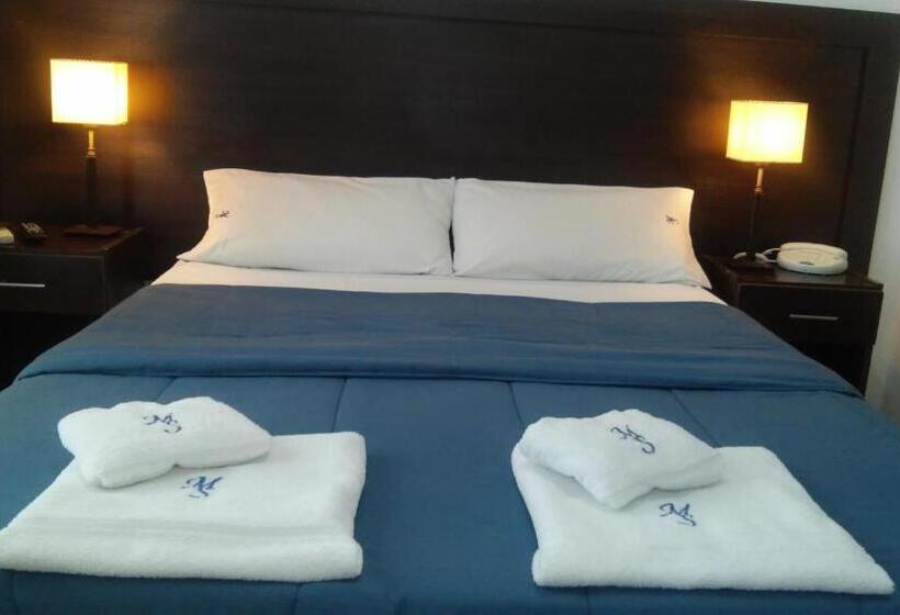 Отель Morada Suites