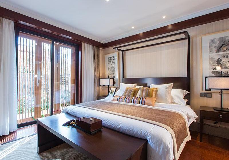 Отель Lijiang Jin Mao Unique & Resort