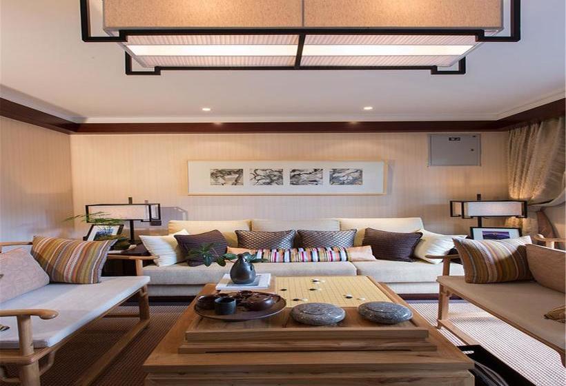 Отель Lijiang Jin Mao Unique & Resort