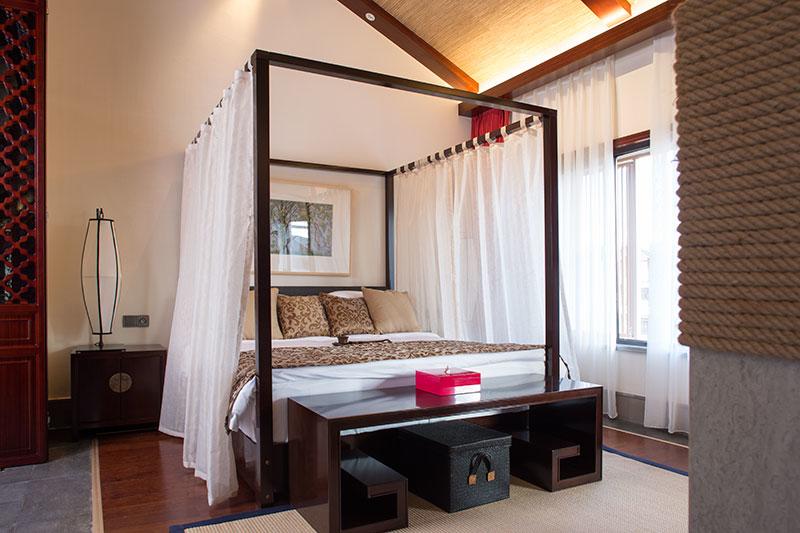 Отель Lijiang Jin Mao Unique & Resort