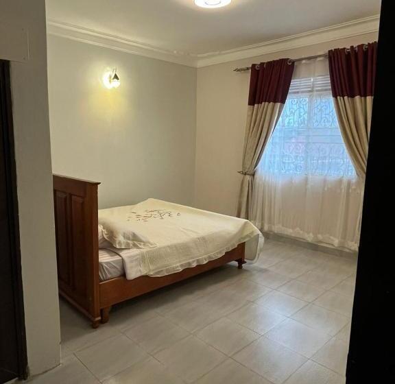 تختخواب و صبحانه Ronald Virtue Apartments