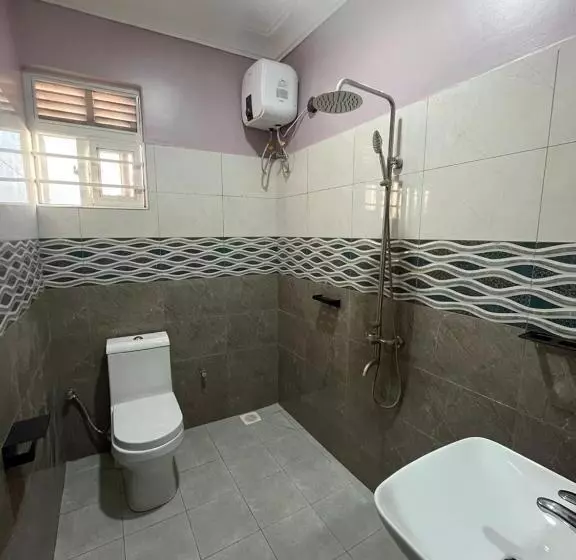 تختخواب و صبحانه Ronald Virtue Apartments