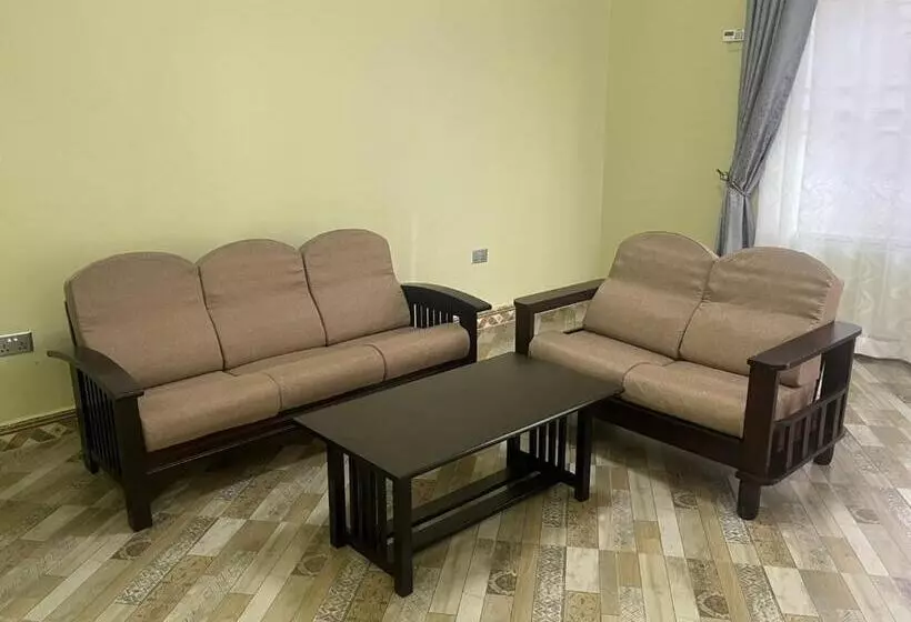 تختخواب و صبحانه Ronald Virtue Apartments