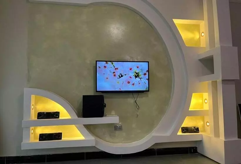 تختخواب و صبحانه Ronald Virtue Apartments