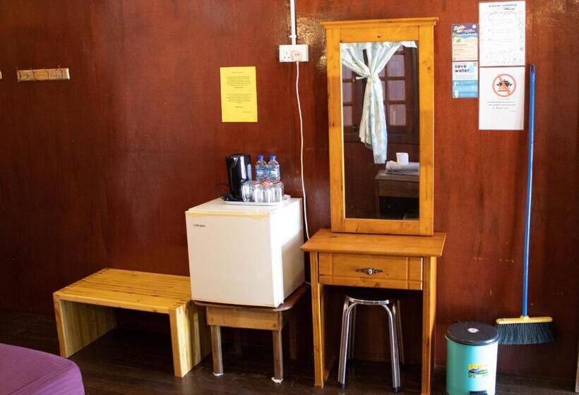 בית מלון כפרי Bushman Tioman