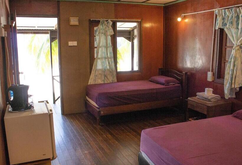 בית מלון כפרי Bushman Tioman