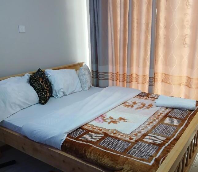 تختخواب و صبحانه Tsavo Apartments Ninty Degrees