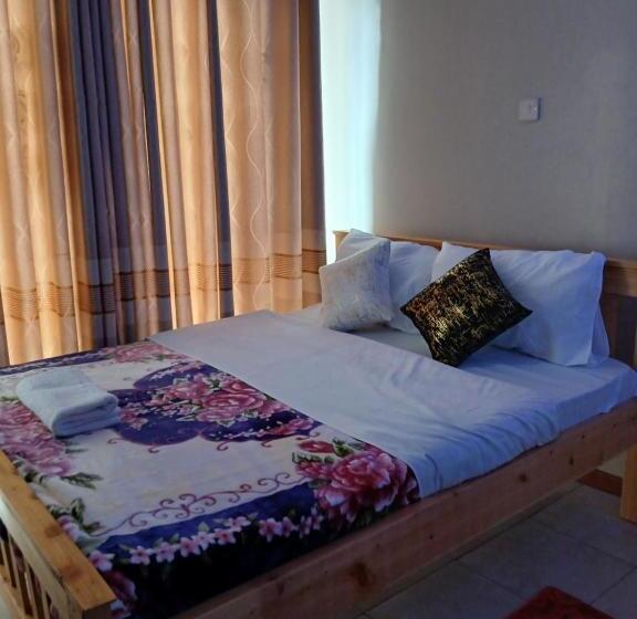 تختخواب و صبحانه Tsavo Apartments Ninty Degrees