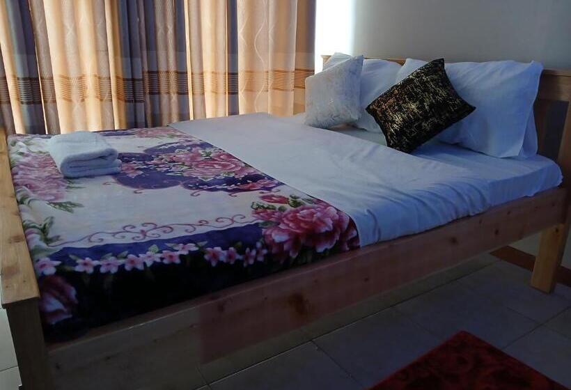 تختخواب و صبحانه Tsavo Apartments Ninty Degrees