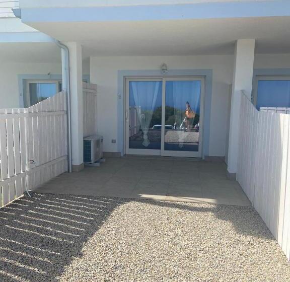 レジデンス Isola Rossa Appartamenti Paduledda