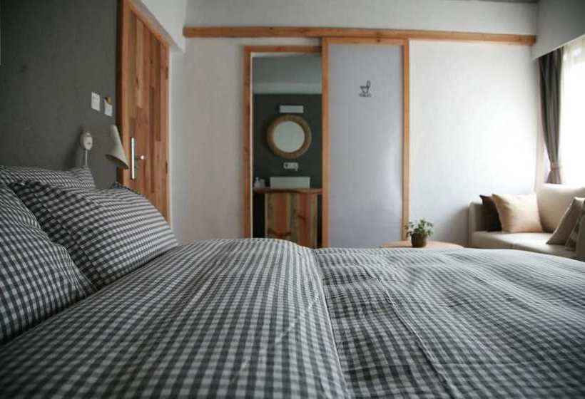 Отель Dali Pure Sea Travelling With