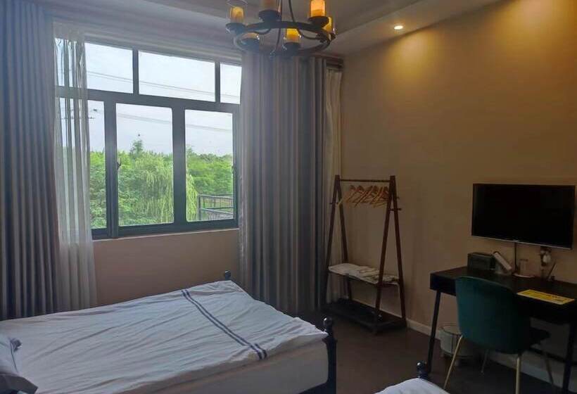 Pensione Shanghai Hua Xi Shui Xie Guesthouse
