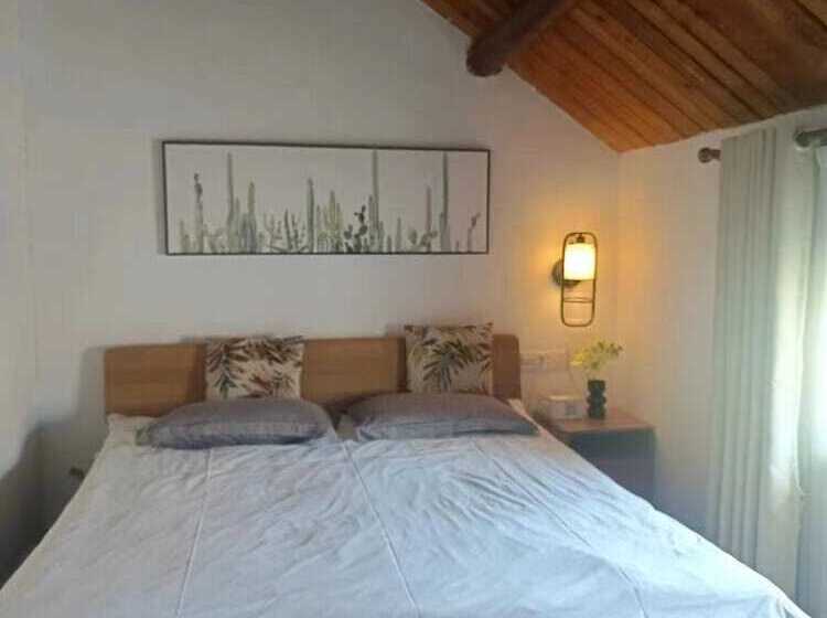 Pensione Shanghai Hua Xi Shui Xie Guesthouse