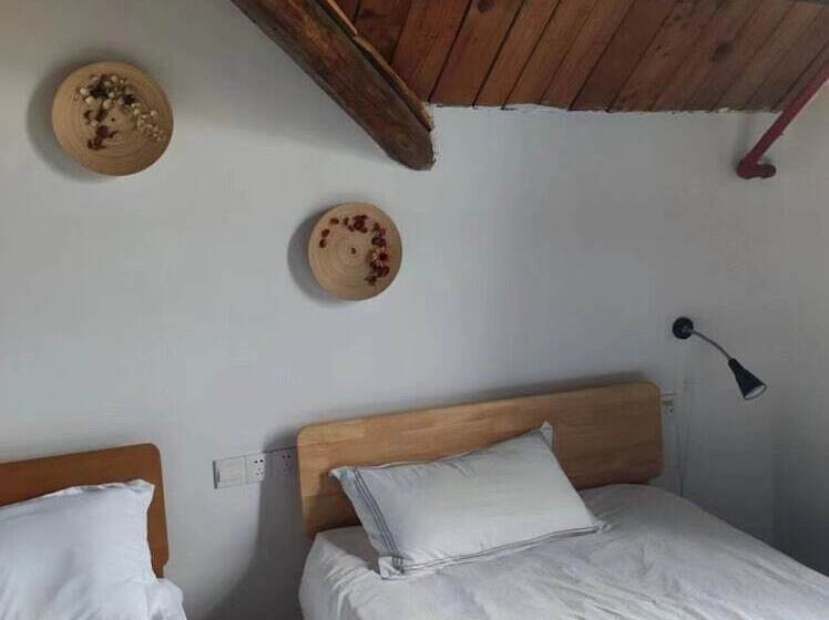 Pensione Shanghai Hua Xi Shui Xie Guesthouse