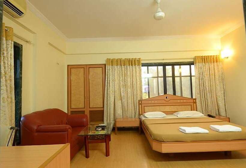 Отель Pooja International