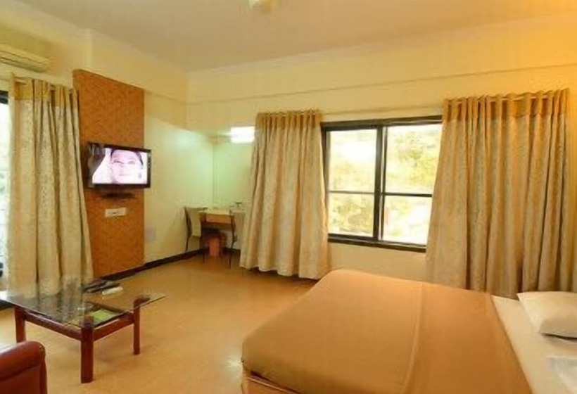 Отель Pooja International