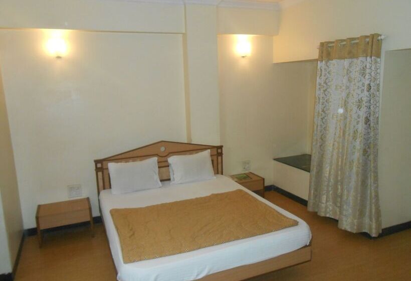 Отель Pooja International