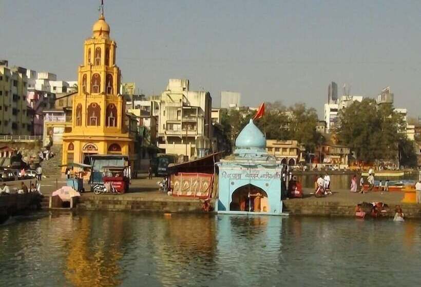 Отель Pooja International