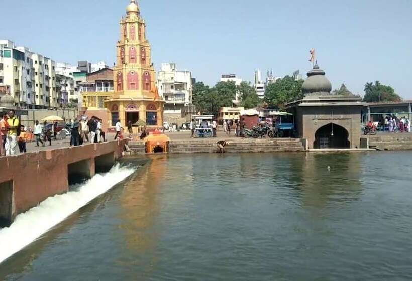 Отель Pooja International