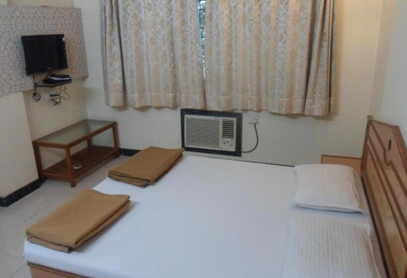 Отель Pooja International