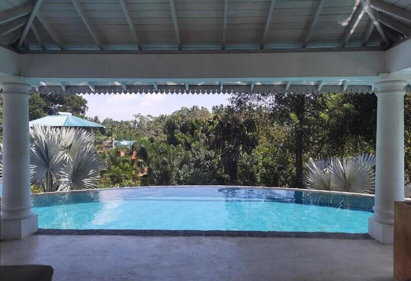 펜션 The Travellers Palm