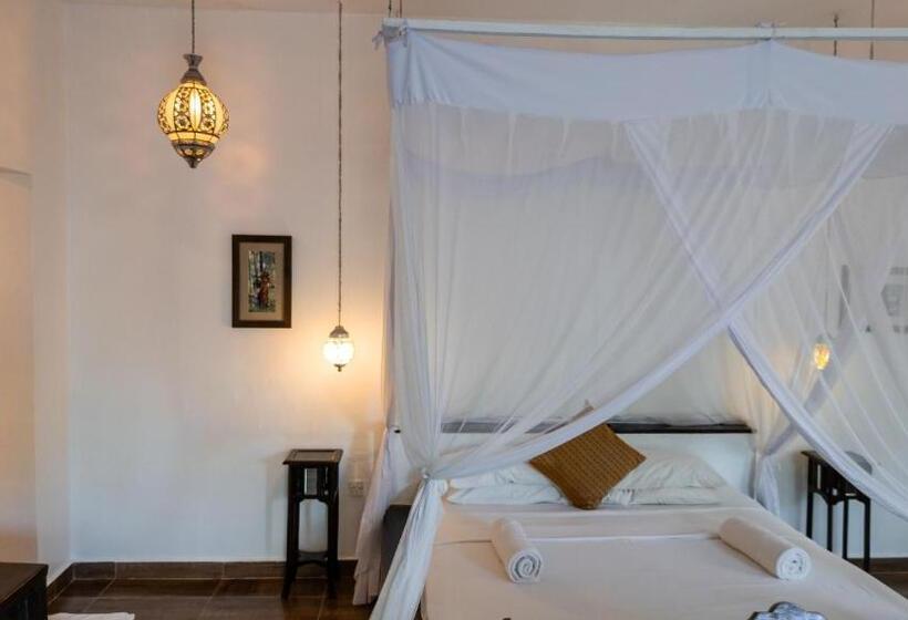 בית מלון כפרי Jafferji Beach Retreat