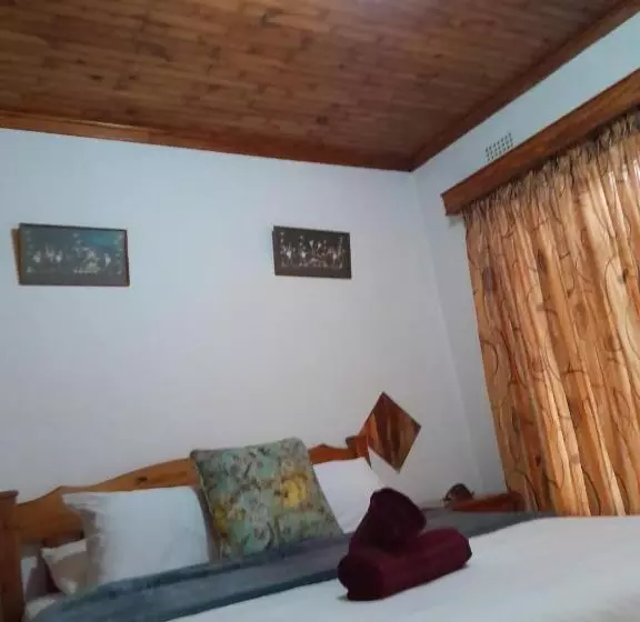 ペンション Mantombi S Guest House