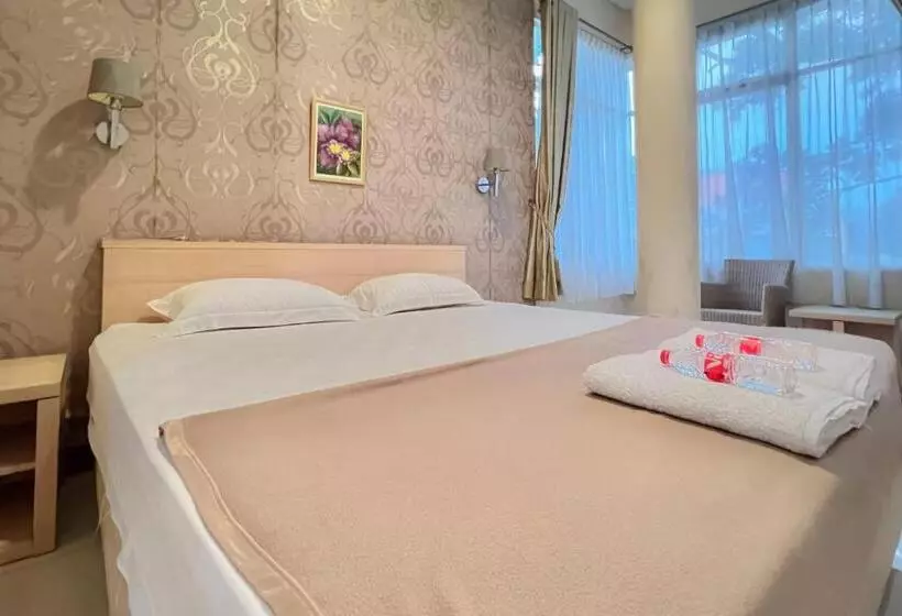 Hotelli Wisma Anggrek Syariah Mitra Reddoorz