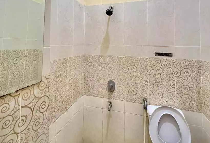 Hotelli Wisma Anggrek Syariah Mitra Reddoorz