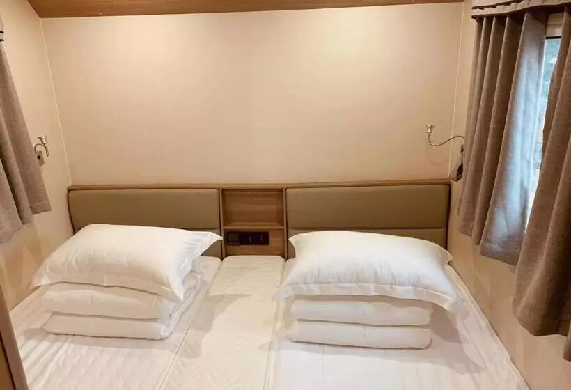 リゾートホテル Zhangjiajie Cliff Flower Rv Tent