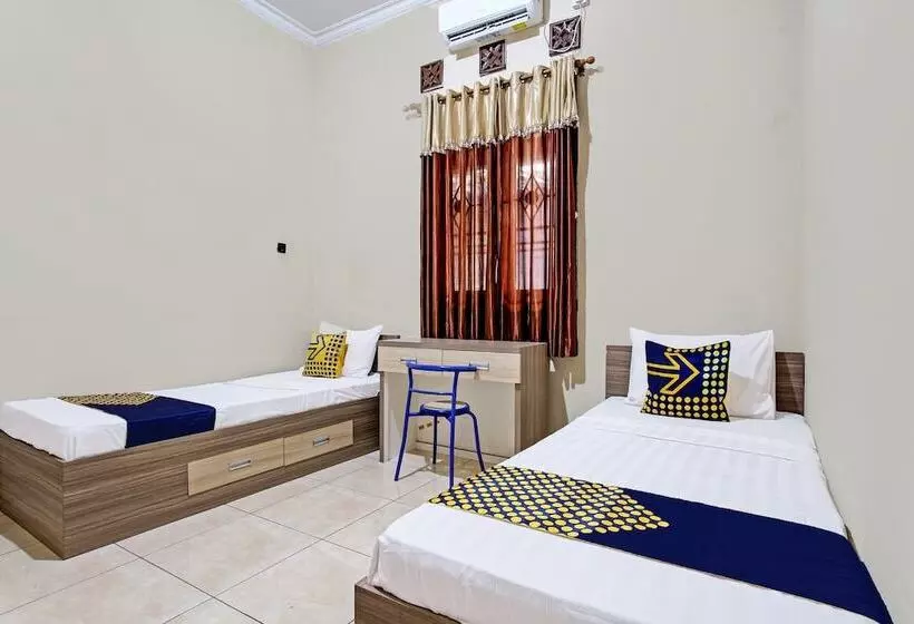 Hotelli Spot On 92424 Wulan Homestay Syariah