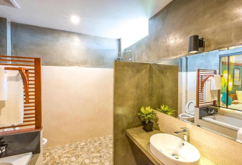 Отель The Tito Suite Residence