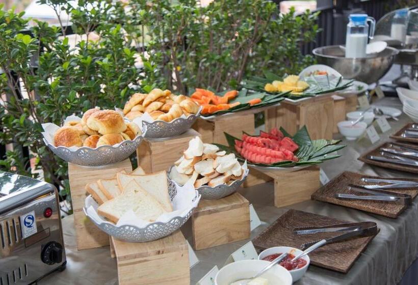 Отель The Tito Suite Residence