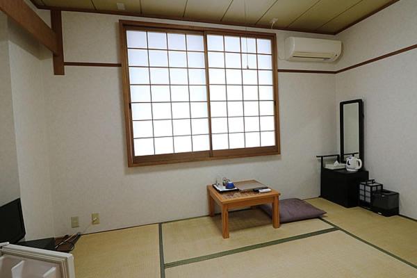 בית מלון כפרי Zurich Toho 2001