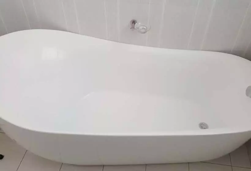 تختخواب و صبحانه First Avenue Guest House