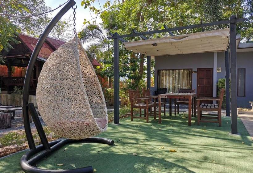 Отель Again At Naiharn Beach Resort